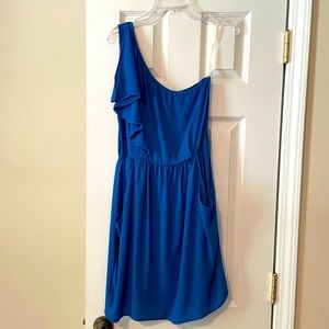 Boutique one shoulder dress with pockets. Size M.